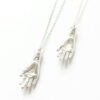 sterling silver grasp hand pendant